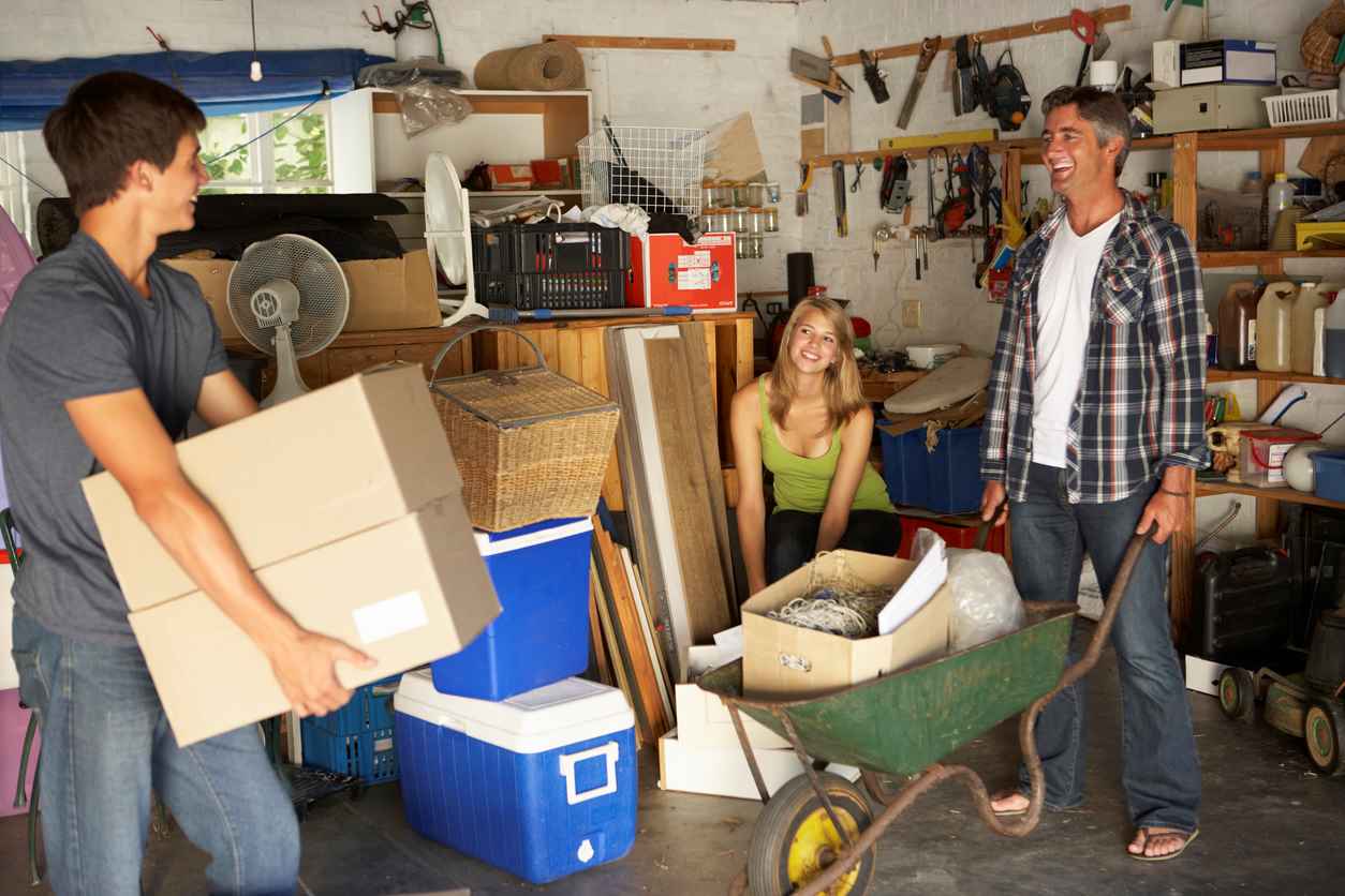 A family organizing their garage